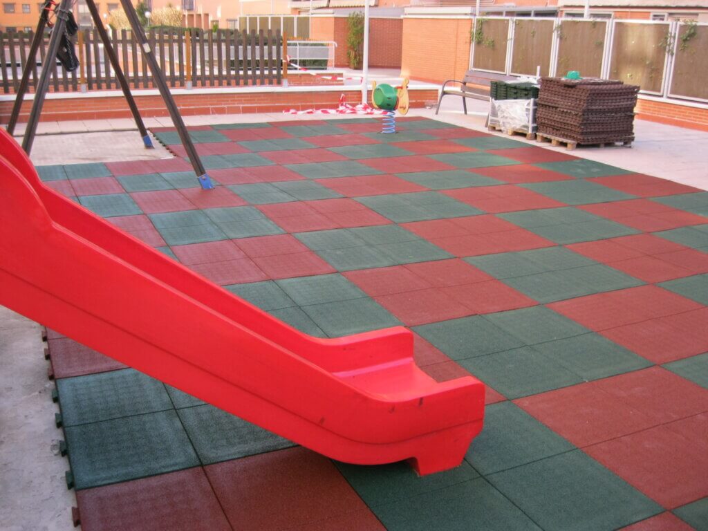 instalación de suelo de caucho